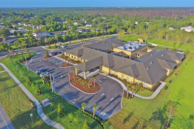 Inspiration for a huge contemporary one-story exterior home remodel in Orlando