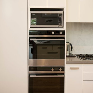 Contempory Kitchen with Urban Ceasarstone Benchtops