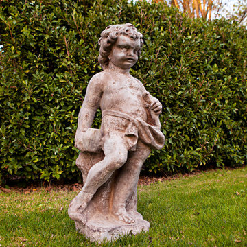 Cherub Sculptor Statue