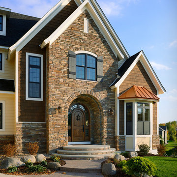 Traditional Exteriors Featuring Stone