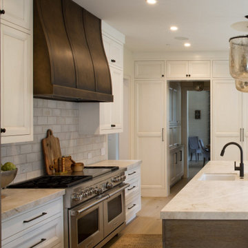 The Timeless Kitchen: Warm Ceramic Textures and Bronze Accents