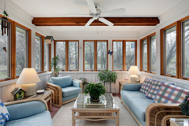 Inspiration for a timeless medium tone wood floor sunroom remodel in Chicago with a standard ceiling