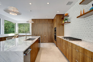 Inspiration for a mid-century modern kitchen remodel in Austin with an island