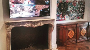 Classic country style TV installation over fireplace