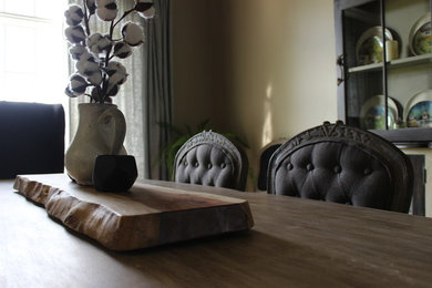 Inspiration for a mid-sized timeless dark wood floor and brown floor enclosed dining room remodel in New York with beige walls