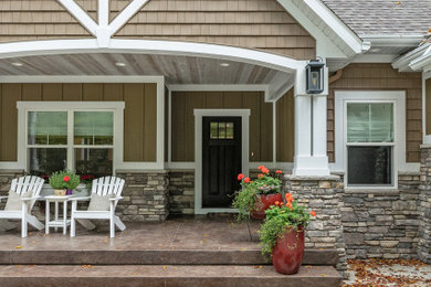 Inspiration for a coastal exterior home remodel in Grand Rapids