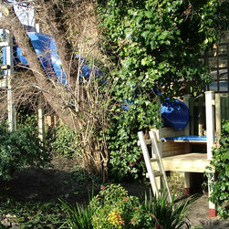 Large treehouse with large slide - Outdoor Playhouses
