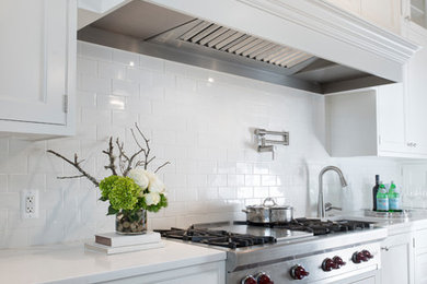 Eat-in kitchen - large transitional l-shaped medium tone wood floor eat-in kitchen idea in Detroit with a single-bowl sink, beaded inset cabinets, white cabinets, quartz countertops, white backsplash, subway tile backsplash, stainless steel appliances and an island