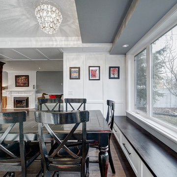 Dining area with custom window bench with stained maple top and oil rubbed bronz