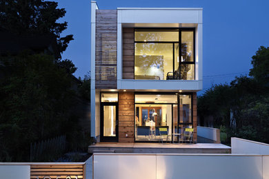 Modern exterior in Edmonton with wood siding.