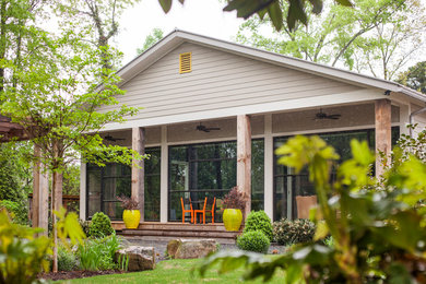 Example of a trendy beige one-story house exterior design in Atlanta
