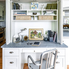 Formal living conversion to office with built in on long wall/glass doo