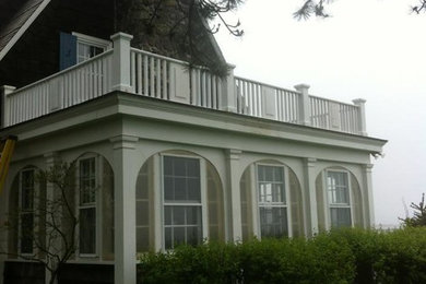 Example of a mid-sized backyard deck design in Portland Maine