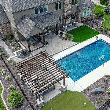 Versatile Outdoor Escape: Turf, Patio, Pergolas & Water Features