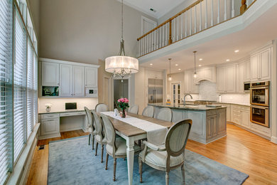 Kitchen/dining room combo - mid-sized traditional light wood floor kitchen/dining room combo idea in Orange County with beige walls and no fireplace