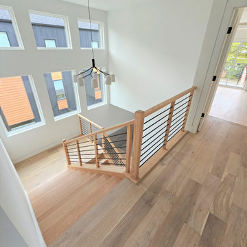 Project #108 | Red Oak Staircase in Light-Filled Space