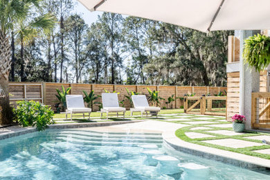 Beach style pool photo in Charleston