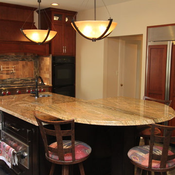 Rustic Craftsman Cherry Kitchen with Contrasting Espresso Island in Bel Air, MD