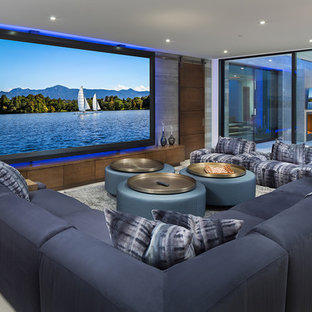 Home theater - beach style open concept gray floor home theater idea in Indianapolis with gray walls and a projector screen