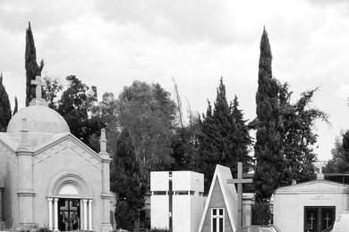 Inspiration for a small modern white one-story stone flat roof remodel in Mexico City with a mixed material roof