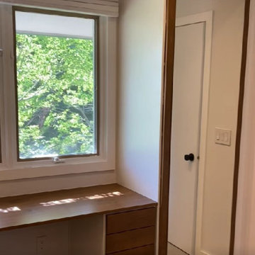 Modern Master Closet with Lighting and Drawers