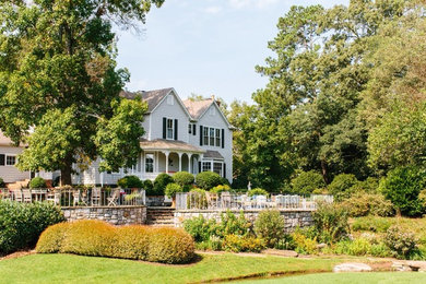 This is an example of a farmhouse landscaping in Other.