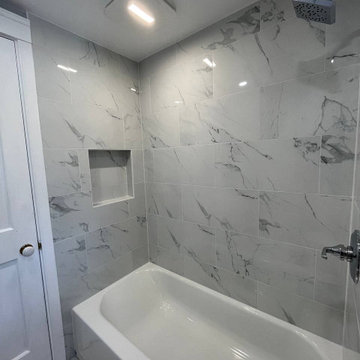 Wellesley Home Revival: Dual Bathroom Renewal & Kitchen Elegance