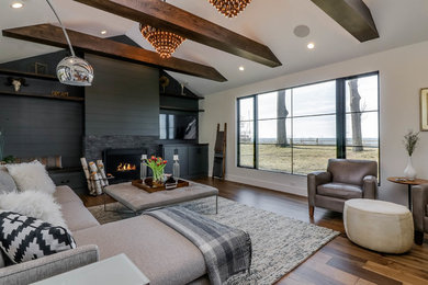 Minimalist family room photo in Grand Rapids