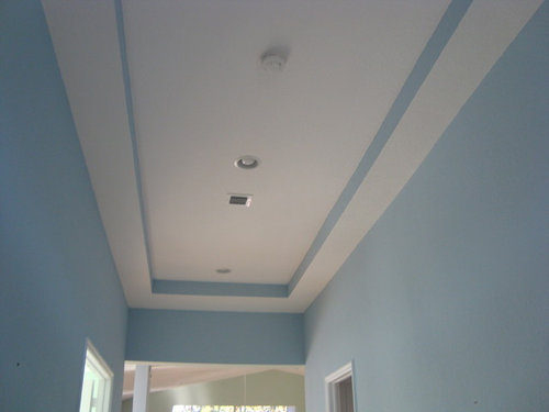 Long Entry Hallway With Tray Ceiling And Recessed Lighting