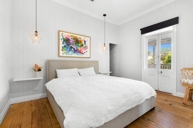 Photo of a transitional bedroom in Brisbane.