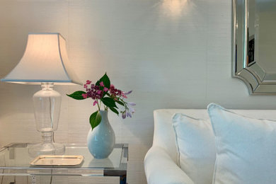 Example of a minimalist wallpaper family room design in New York