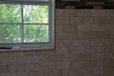Bathroom - mid-sized traditional beige tile and travertine tile travertine floor and beige floor bathroom idea in Other with open cabinets, white cabinets, a two-piece toilet, beige walls, an undermount sink and granite countertops