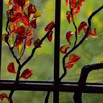 Kitchen stained glass window with flamed worked leaves.