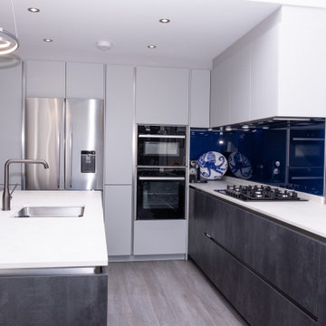 Handless Kitchen with Blue Splashback in Stanmore By Kudos Interior Designs