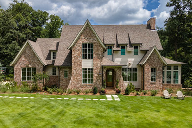 Example of a transitional exterior home design in Birmingham
