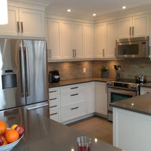 Counter with cabinets and applicences