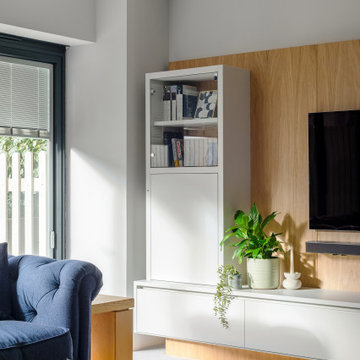 LUXURY FULLY FITTED LIVING ROOM WITH BESPOKE BOOKCASES AND MEDIA WALL