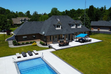 Complete Backyard Makeover with Modern Limestone Concrete Patio, Pool Deck and F