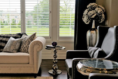Large transitional open concept medium tone wood floor family room photo in Columbus with gray walls