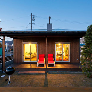 他の地域のインダストリアルスタイルのおしゃれな裏庭のデッキ (張り出し屋根) の写真