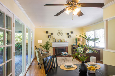 Example of a mid-century modern dining room design in Los Angeles