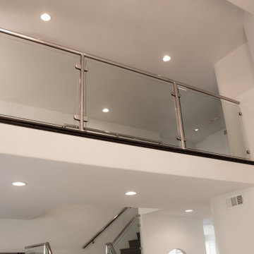 High Ceiling Conversion with Glass Railing