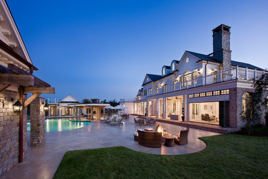 Huge traditional white three-story mixed siding gable roof idea in Orlando