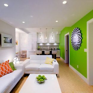 Photo of a small modern fully buried basement in Vancouver with white walls.