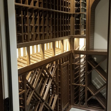 Assorted Wooden Wine Racking Kits Installed in Traditional Cellar