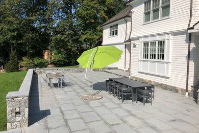 Patio - modern patio idea in New York