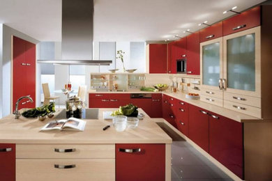 Eat-in kitchen - small 1950s galley painted wood floor and wallpaper ceiling eat-in kitchen idea in Other with flat-panel cabinets, wood countertops and two islands