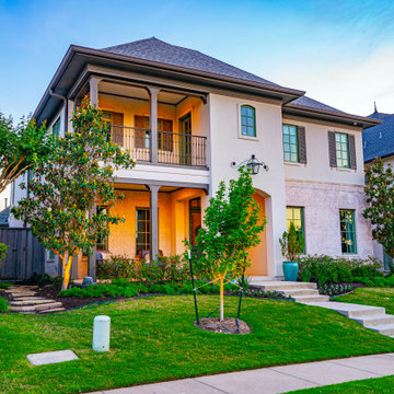 Elegant Home Remodel with Lush Landscaping and Inviting Curb Appeal