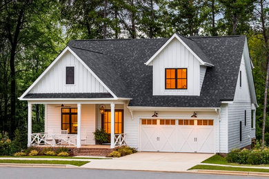 Farmhouse white two-story mixed siding house exterior idea in Cincinnati with a shingle roof