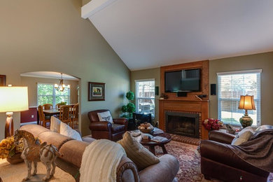 Example of a classic family room design in Denver